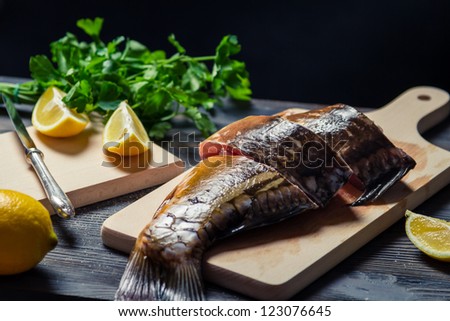Sliced Ã?Â¢??Ã?Â¢??fresh fish on the board before frying
