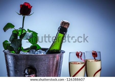 [Obrazek: stock-photo-red-rose-and-champagne-in-ic...388607.jpg]