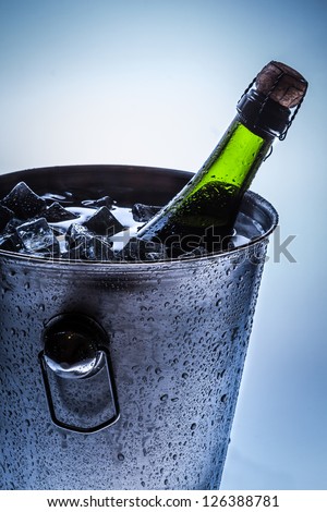 Ice Bucket with cold champagne and ice
