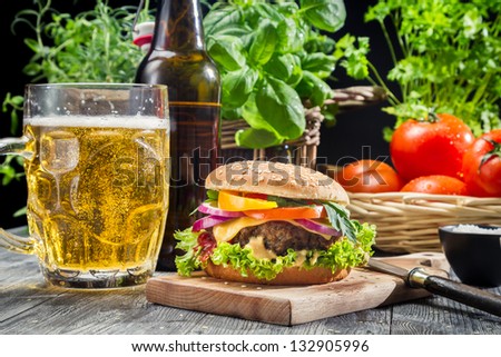 Homemade burger and a cold beer
