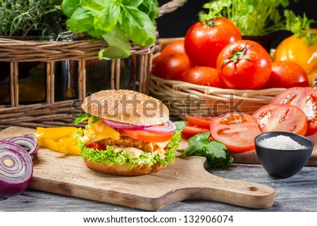 Homemade hamburger with chicken and vegetables
