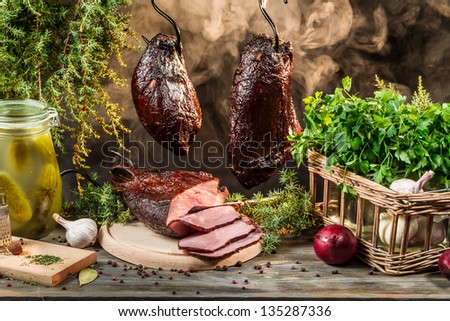 Smokehouse ham preparation for smoking in countryside