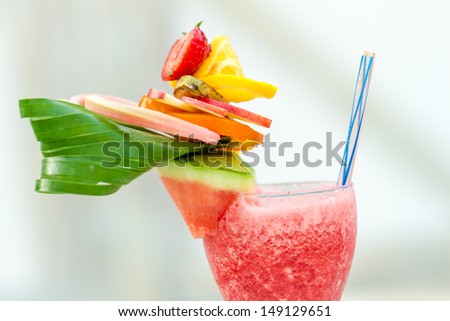 Refreshing summer drink with strawberries and watermelon
