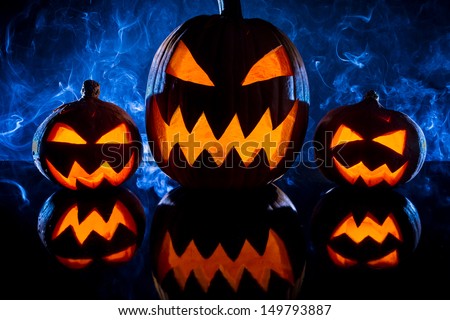Pumpkins for Halloween on a blue background