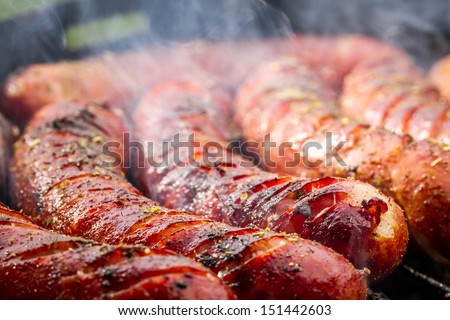 Closeup of sausage on the grill