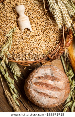 Whole grain bread with a basket full of grains