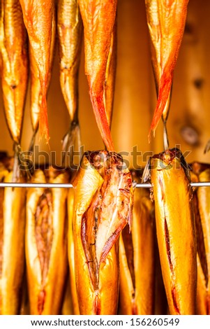 Closeup of smoked fish in smokehouse
