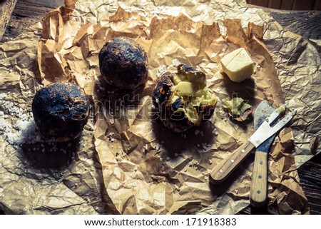 Fresh made jacket potatoes with butter and salt