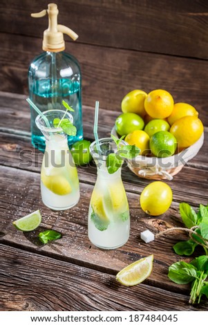 Fresh lemonade with fruit and mint