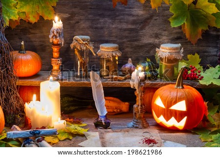 Witch table with halloween pumpkin