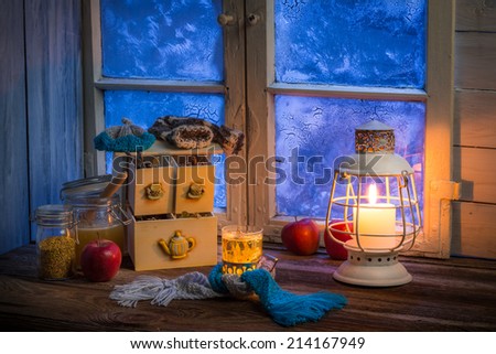 Warming tea in a winter cottage