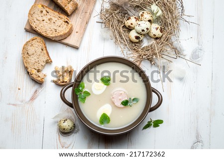 Homemade soup with eggs and sausage