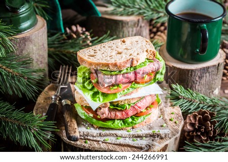 Coffee and homemade sandwich for lumberjack