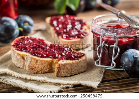 Closeup of sandwich with fresh plum jam