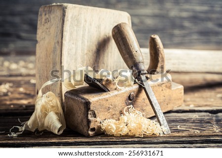 Wooden hammer and planer in a carpentry workbench