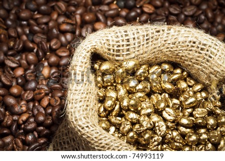 Golden coffee seeds on burlap coffee sack