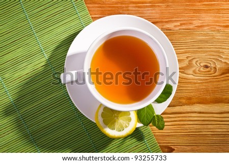 [Obrazek: stock-photo-hot-tea-and-lemon-on-bamboo-...255733.jpg]