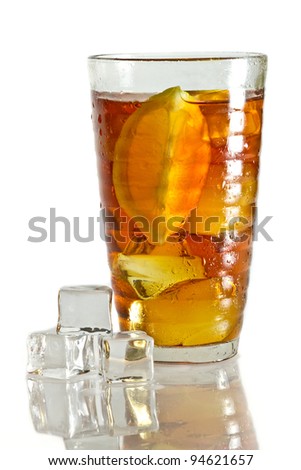 Tree ice cubes and cold tea in glass