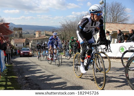 ALLEX, FRANCE - MAR 02: Thierry Hupond and Arnaud Courteille riding La Classic Drome UCI Europe Tour Pro Race on March 02, 2014 in Allex Hill, Drome, France. Romain Bardet won the race.