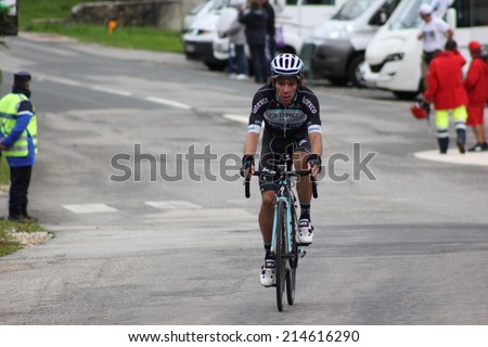 LELEX, FRANCE - AUG 15: Rigoberto Uran, colombian rider, riding Le Tour de l\'Ain UCI Europe Tour Pro Race on August 15, 2014 in Lelex, Monts du Jura, Ain, France. Bert-Jan Lindeman won the race.