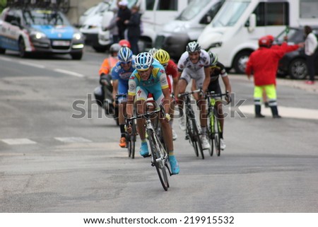 LELEX, FRANCE - AUG 15: Artur Fedosseyev, kazakh rider riding Le Tour de l\'Ain UCI Europe Tour Pro Race on August 15, 2014 in Lelex, Jura, Ain, France. Bert-Jan Lindeman won the race.