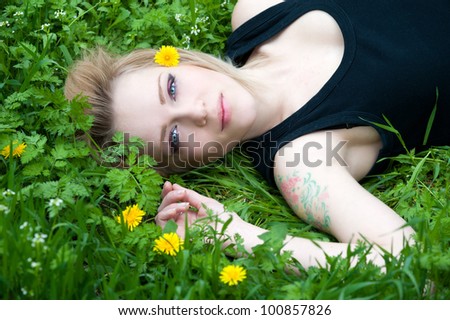 Beautiful alternative woman enjoying field