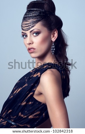 Fashion model with  beautiful hairstyling and makeup,pastiche Egypt
