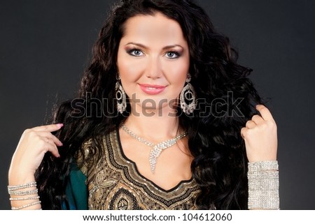 Beautiful young brunette belly dance woman