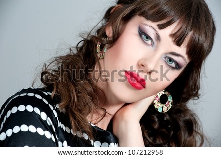 Beautiful woman with evening make-up. Evening hairdress