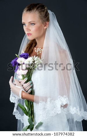 Beautiful bride with stylish make-up and hairdo