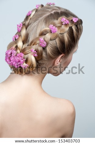Beauty wedding hairstyle with wlowers. Bride