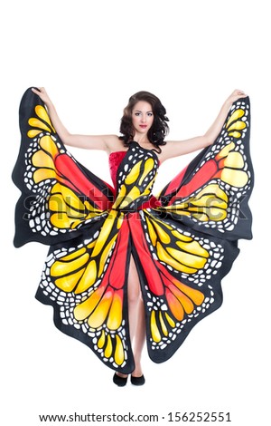 Woman in a dress with a pattern monarch butterflies. Fancy-dress party. Halloween