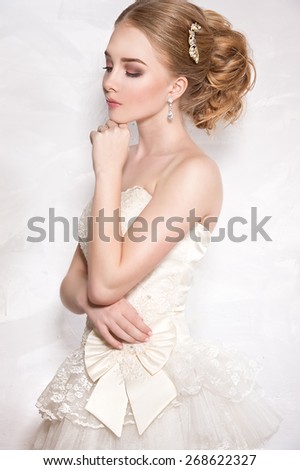 Beautiful bride. Wedding hairstyle and make up
