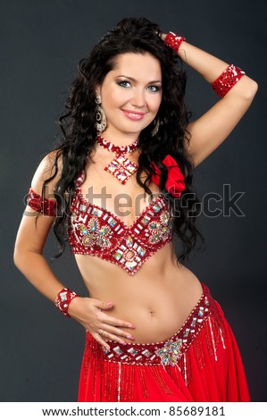 Beautiful young brunette arabic belly dance woman