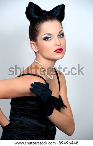 Beautiful woman with bow coiffure