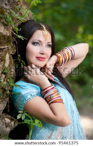 young beautiful brunette in the indian national dress