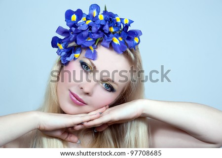 Beautiful young blonde woman with <b>iris flower</b> - stock photo - stock-photo-beautiful-young-blonde-woman-with-iris-flower-97708685