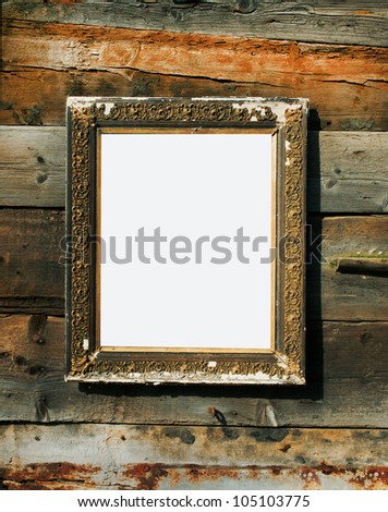 old grunge rectangular empty frame on wooden background