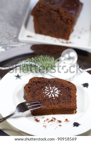 Slice of Christmas cake with dessert fork