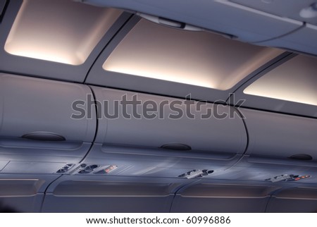 Cabin inside the aircraft, lights and signs