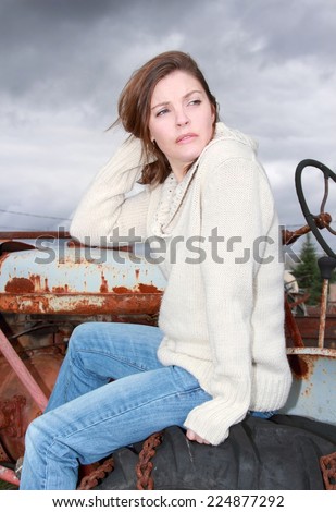 woman sitting on a tractor