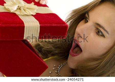 Beautiful Blonde Overjoyed by her Surprise Gift. (Shallow DOF)