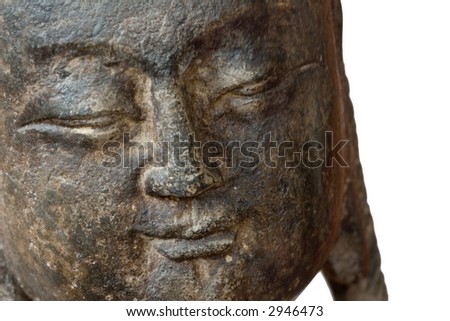 face of a stone buddha close-up