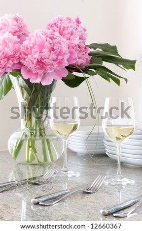 cutlery, wine, plates & flowers - elegant mealtime