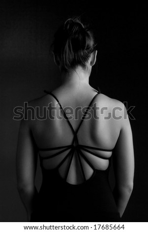 back of the dancer - focus on nape of neck - black and white
