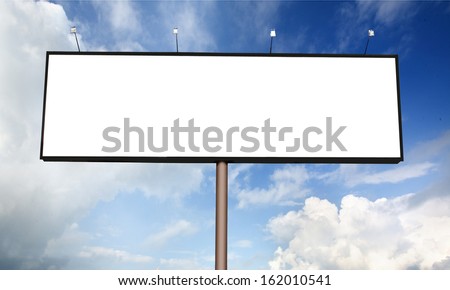Blank billboard on blue sky with sun rays for your advertisement