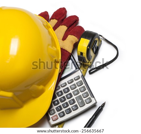 isolated hard hat with gloves and rulers on white