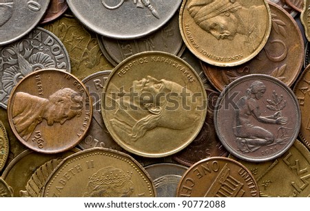 Many old metal coins of different countries of world