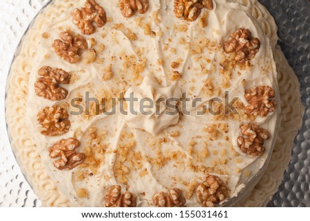 Maple Walnut Cinnamon Cake on silver platter - top view