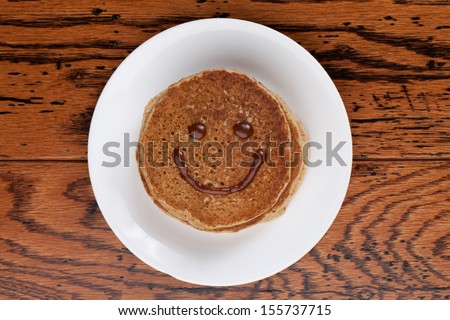 Wholesome whole wheat pancakes with a caramel sauce good morning smile